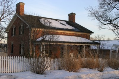 Farm house in the snow.