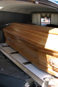 Coffin in a hearse.