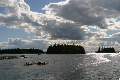 Cloudy skies, dark islands.